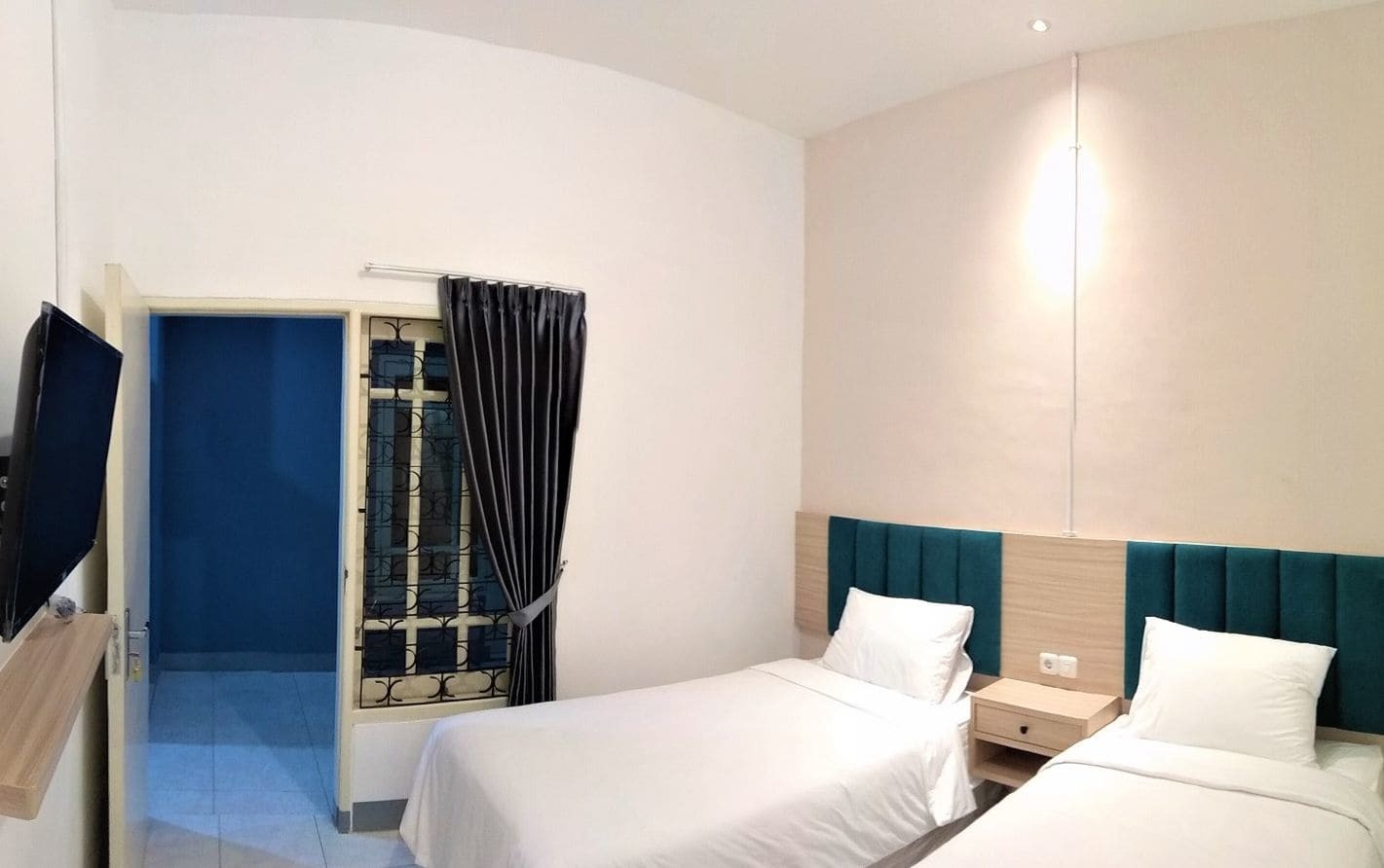 Kokonut Guesthouse Sorabaya Extérieur photo